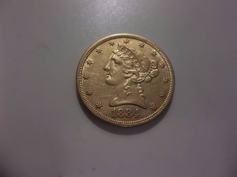 1884- 5 Dollar Gold Piece In Strong AU Condition (14 Oz. Gold)