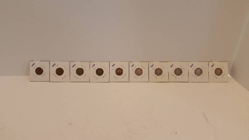 lot 216 image: Lot of (10) Indianhead Pennies - Carded and Labeled