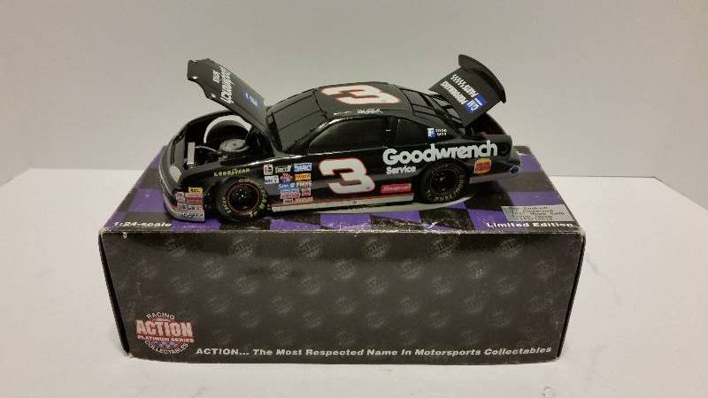 lot 221 image: Action Racing Collectibles 124th Scale #3 Dale Earnhardt GM Goodwrench 1997 Chevrolet Monte Carlo Coin Bank