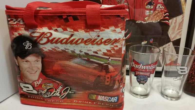 lot 245 image: Large Lot of #8  Dale Earnhardt Jr Memorabelia Items - Print, Summer Cooler, Large Poster, Dale Jr, Glass and 50th Anniversary NASCAR Glass.
