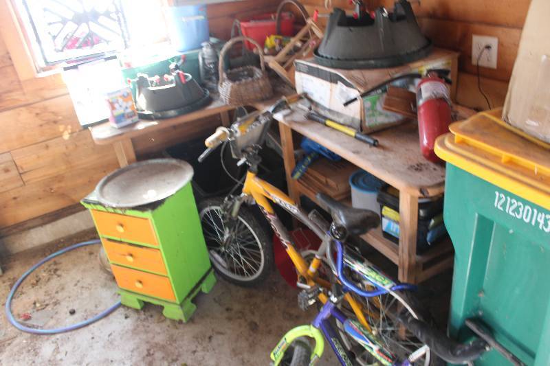 lot 47 image: Corner Lot Includes Kids Bikes, Baskets, Dresser, Fire Extinguisher, Mantle Clock, And More