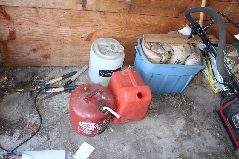 lot 93 image: Floor Lot Includes Gas Cans, Tools