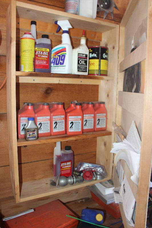 lot 81 image: Shelf Lot Includes Stihl Engine Oil, Tools, And More
