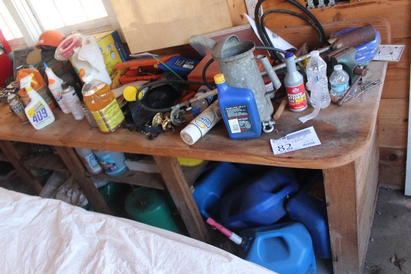 lot 82 image: Shelf Lot & Below Includes Gas Cans, Car Fluids, Vice, Tools, And More