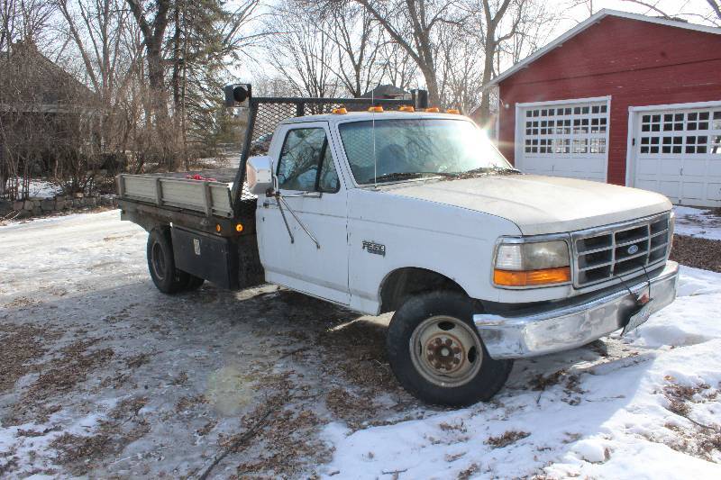 lot 1 image: 1997 Ford F350 2-Door Flatbed Conversion w Stake Bed Side Panels & Tow Hitch