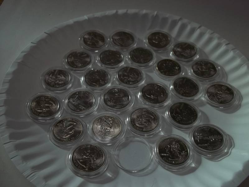 25 Assorted State Quarters in cases