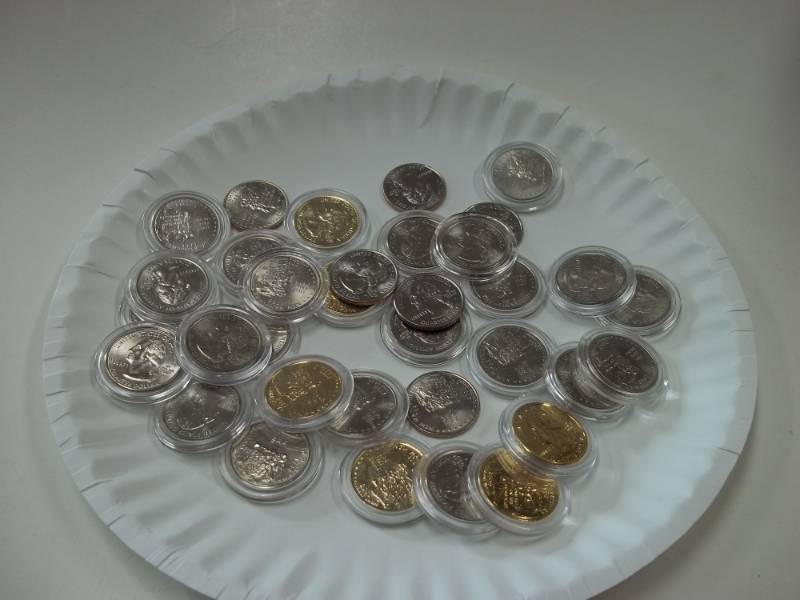 Assorted New Hampshire Quarters in Cases
