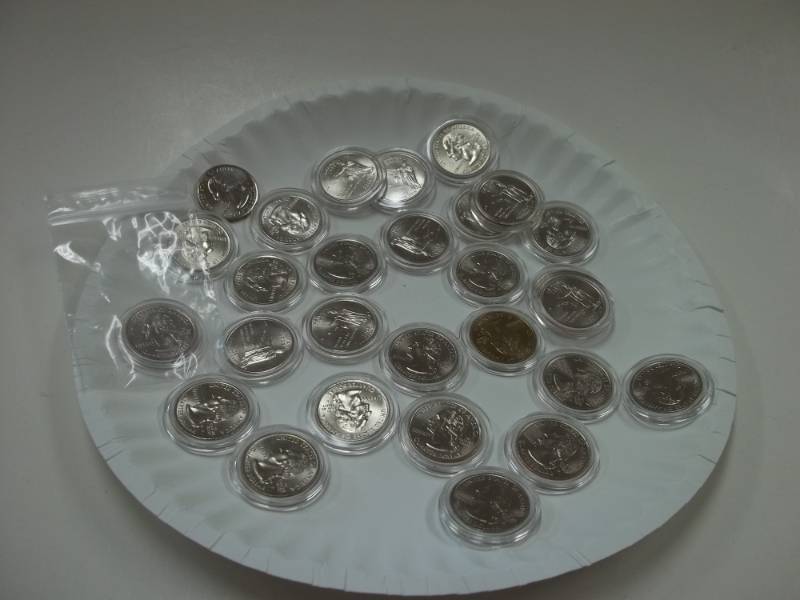 Assorted State Quarters in Cases
