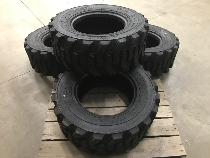 (4) New Skidloader Tires