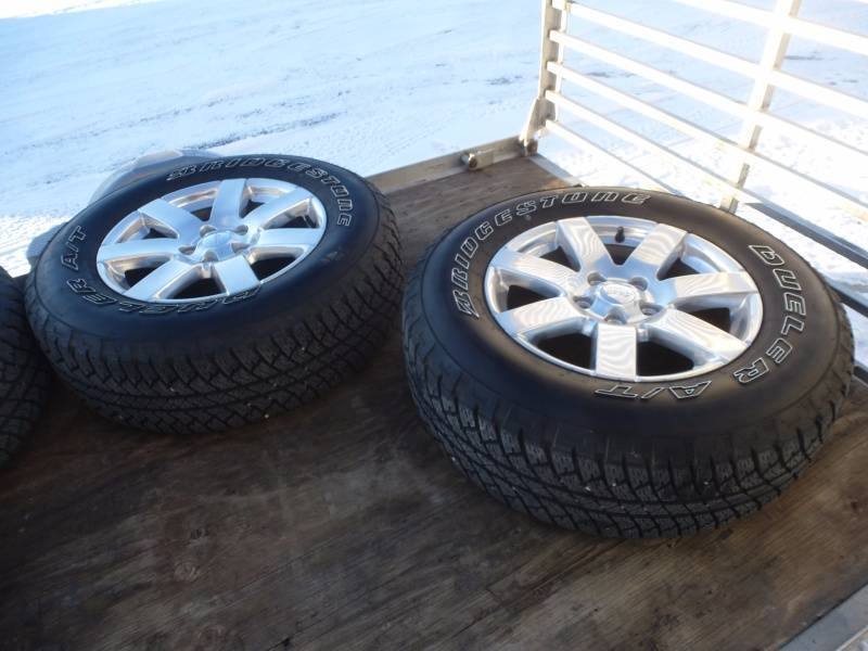 lot 14 image: Jeep Wrangler Rims & Tires Bridgestone