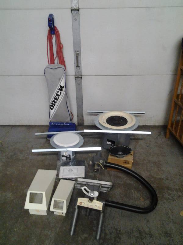 lot 33 image: Recessed Can Light Fixtures, Security Camera Cases, Oreck Upright Vacuum, Shopsmith Saw (Parts Only)