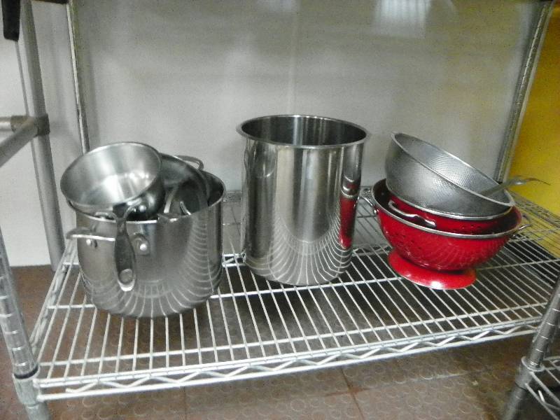 kitchen items, pots and colanders