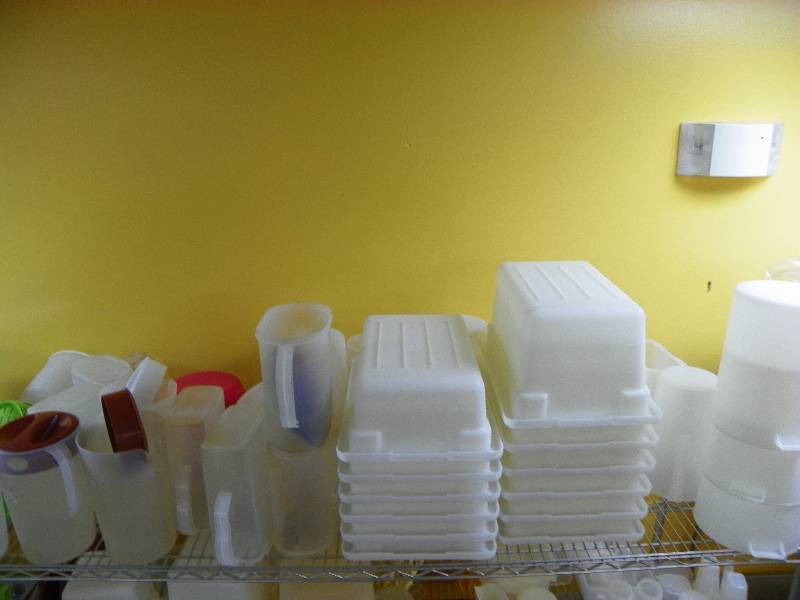 kitchen items, misc storage containers and pitchers