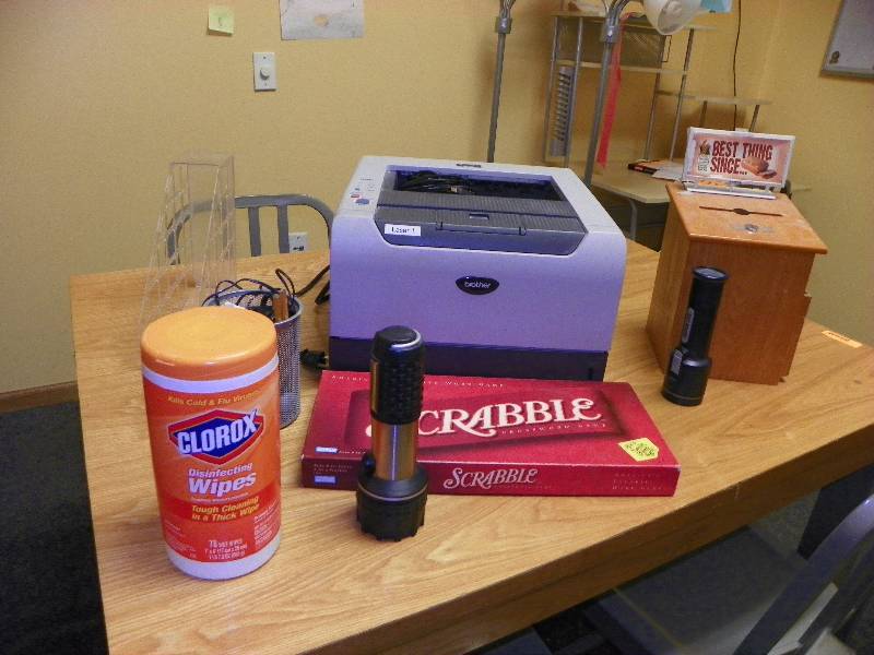 Misc office items, printer, flashlights, Scrabble game, cleaning wipes and suggestion box