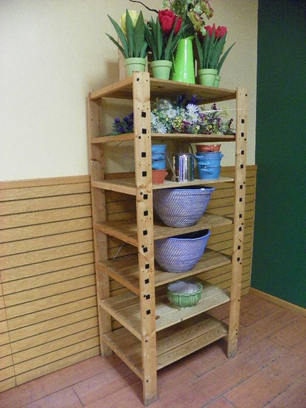 Wooden Shelving unit with pots and artificial plants