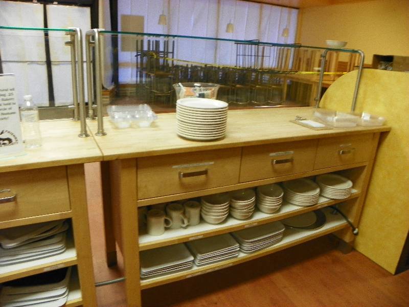 Prep station table with sneeze guard, three drawers and two shelves. Contents NOT included