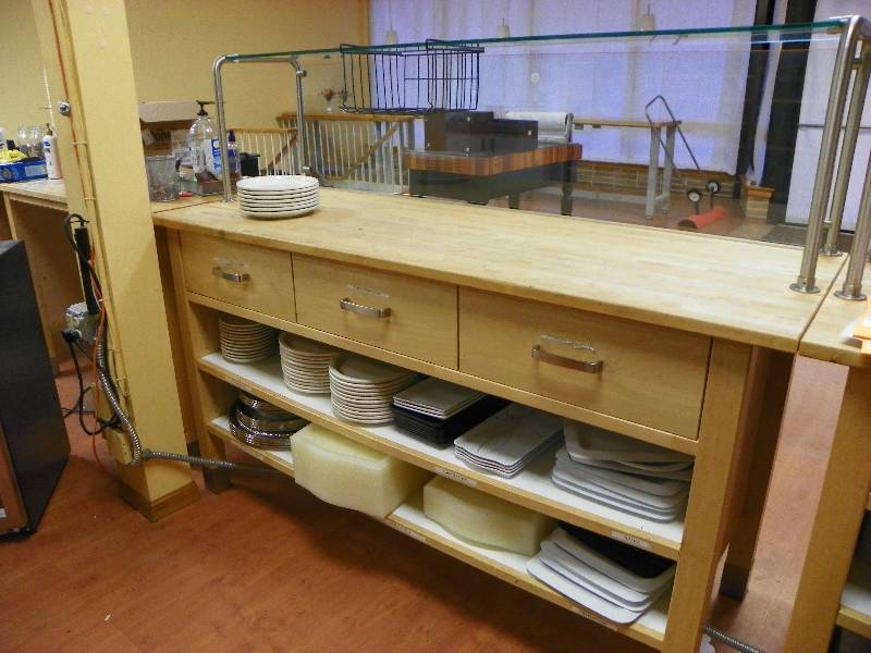 Prep station table with sneeze guard, three drawers and two shelves. Contents NOT included