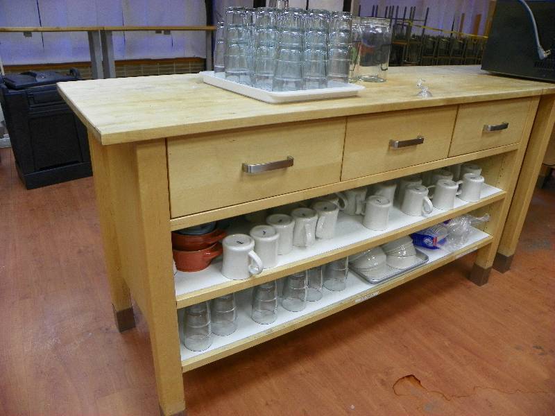 Prep station table, three drawers and two shelves. Contents NOT included