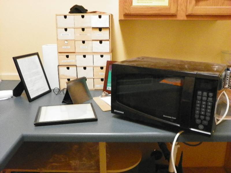 Sylvania microwave oven, picture frame and small organizer for condiments - wood framedrawers