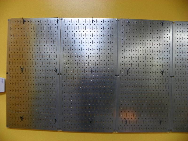 3 stainless wall panels for hanging utensils or pots. Each panel is 32 x 16