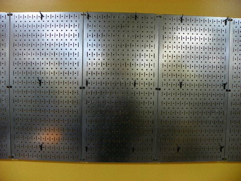 3 stainless wall panels for hanging utensils or pots. Each panel is 32 x 16