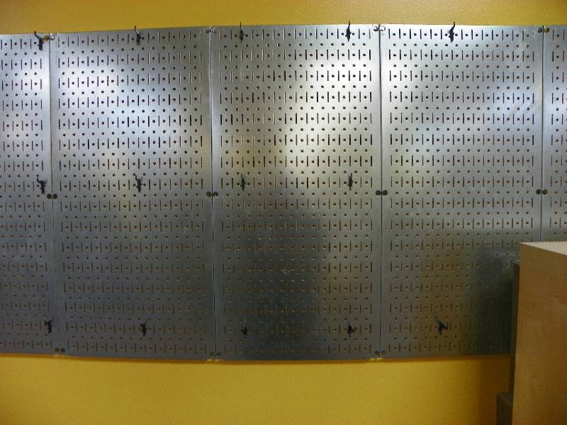 3 stainless wall panels for hanging utensils or pots. Each panel is 32 x 16