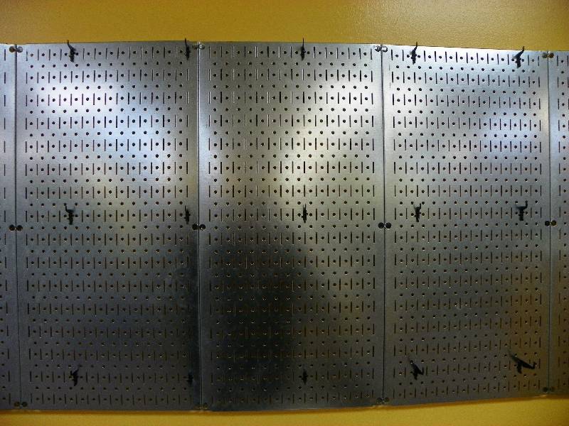 3 stainless wall panels for hanging utensils or pots. Each panel is 32 x 16