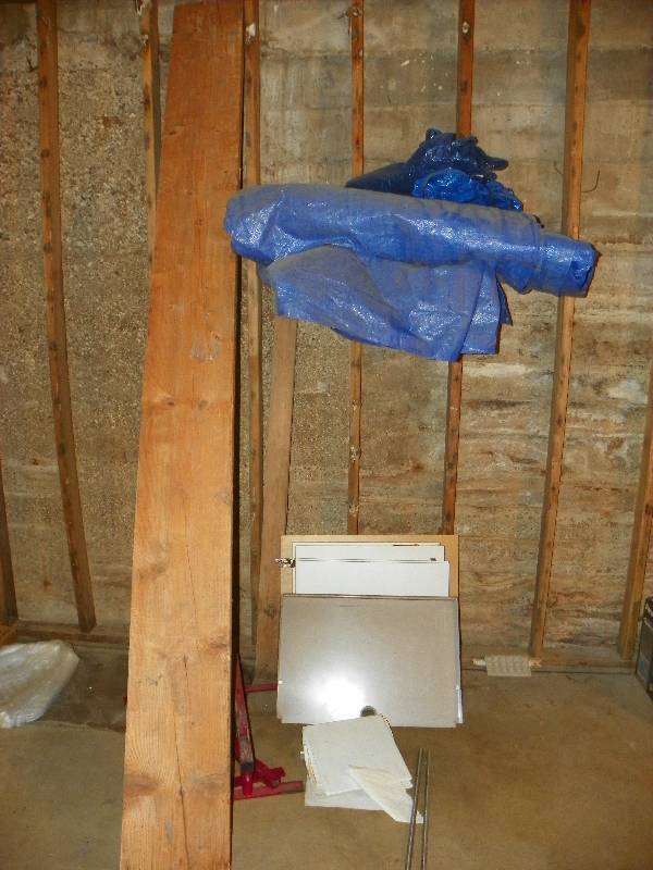 Tarp, Metal bars, wood shelf pieces