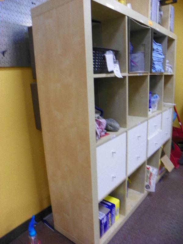 Storage unit, 12 cubicals and 8 drawers, includes contents