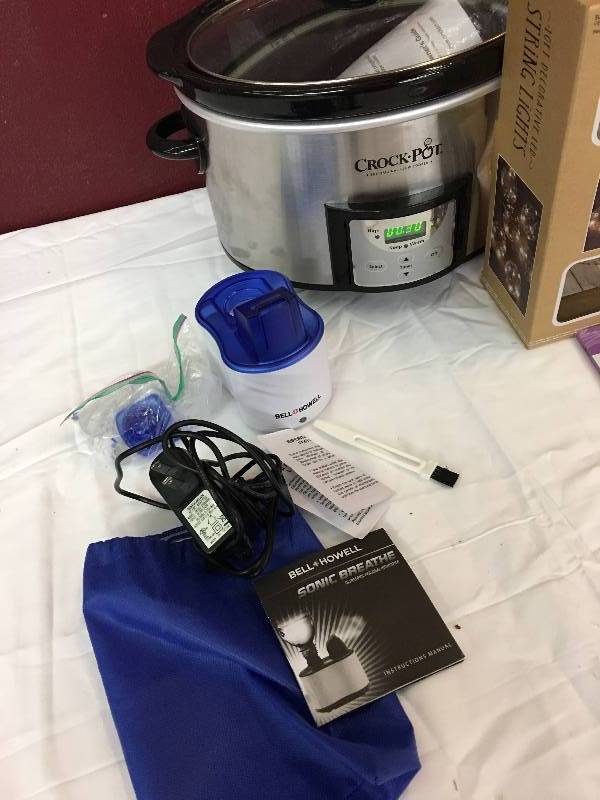 lot 30 image: coloring book,humidifier,crockpot,string lights