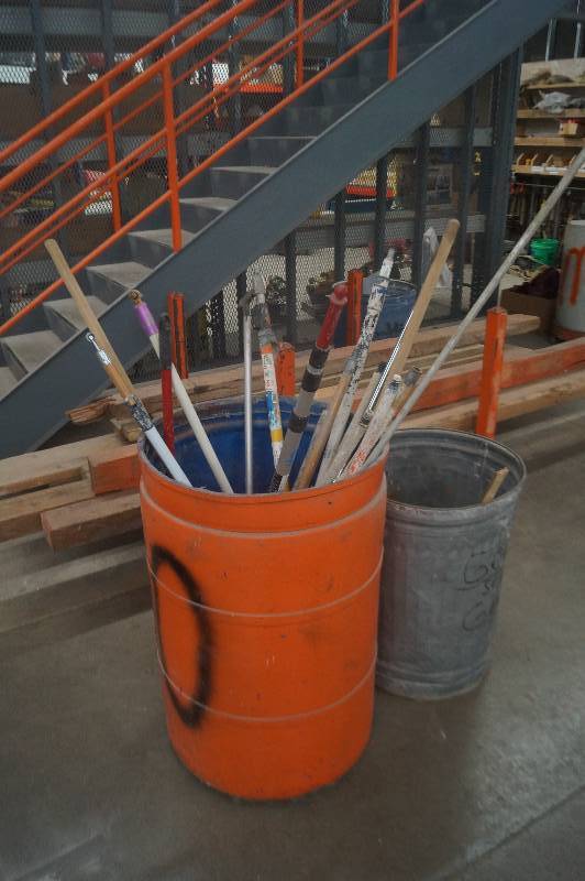 lot 54 image: Garbage Can with Painter Poles