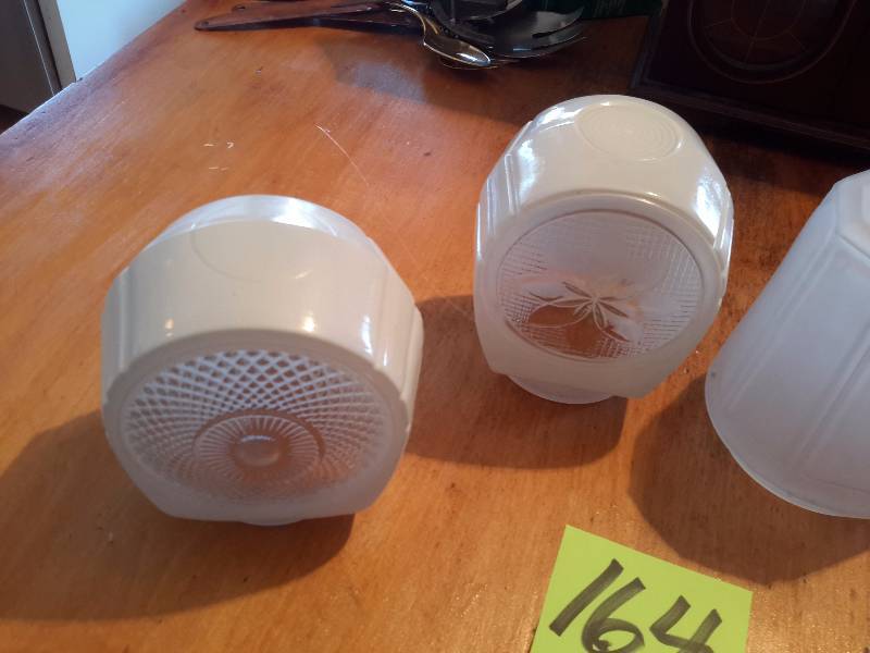 4, frosted light globes as pictured.  Approx 6 in talldiameter