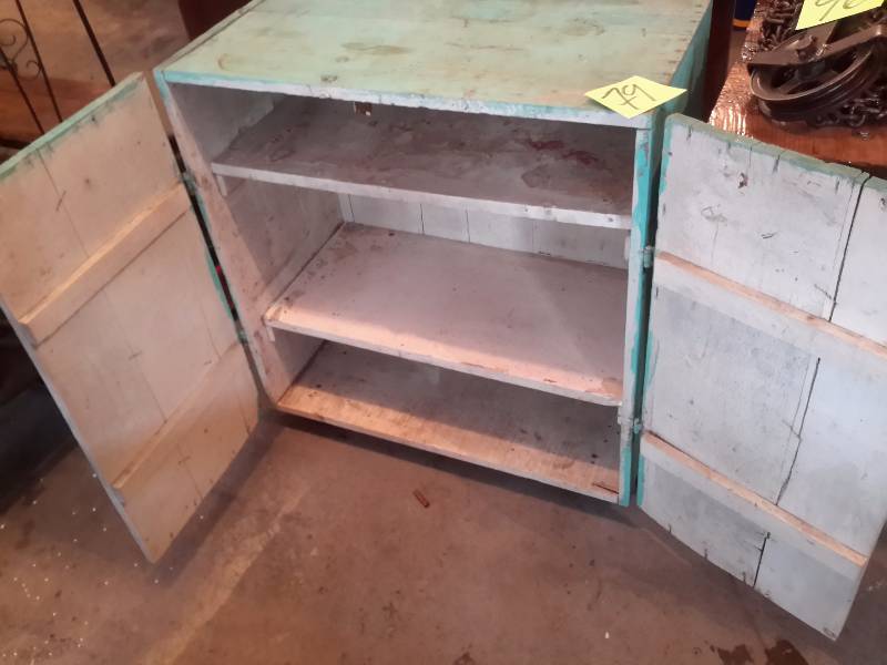 PRIMITIVE Solid wood storage cabinet.  29 12 in x 17 in x 32in.. Has casters
