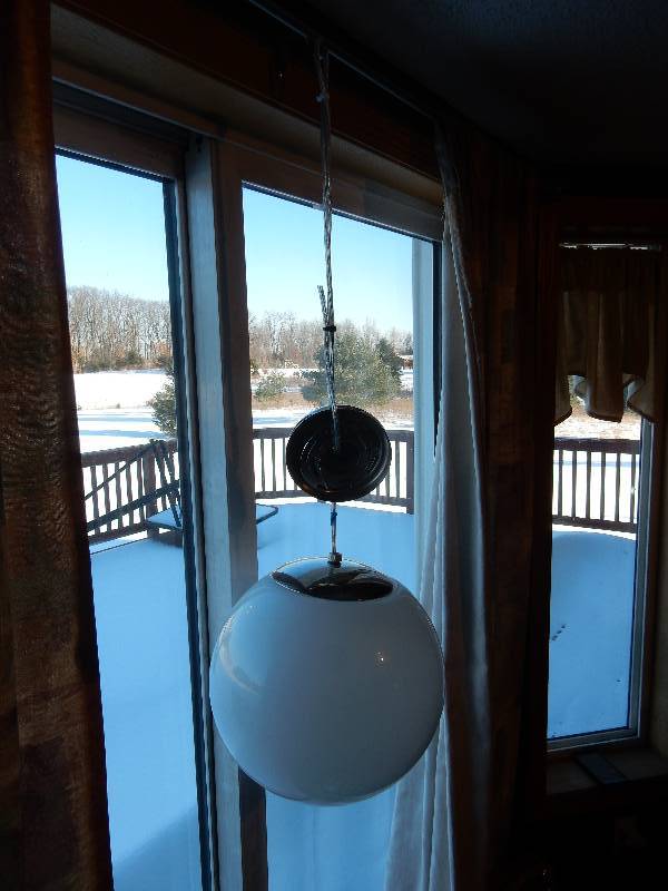 Nice Mid Centuryj,  globe style hanging lamp.. Newly Wired.. Ready to be hooked up.