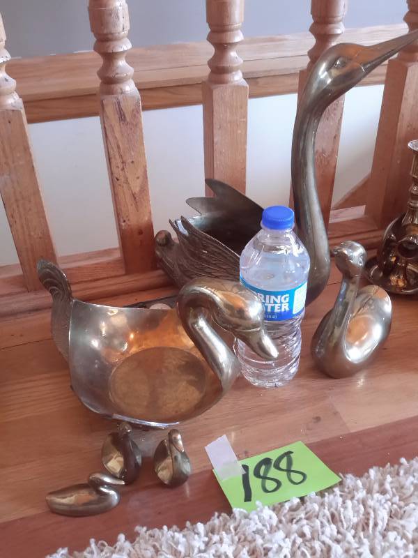 Brass Decorative Items as pictured  (Goose, Duck Themed)  See bottle for size perspective