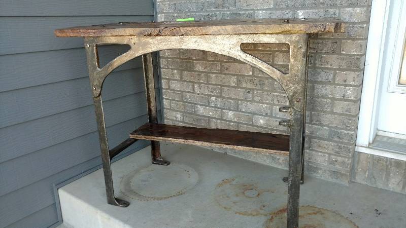 Beautiful Wood table Cast Iron Table woption to attach Swivel Chair.