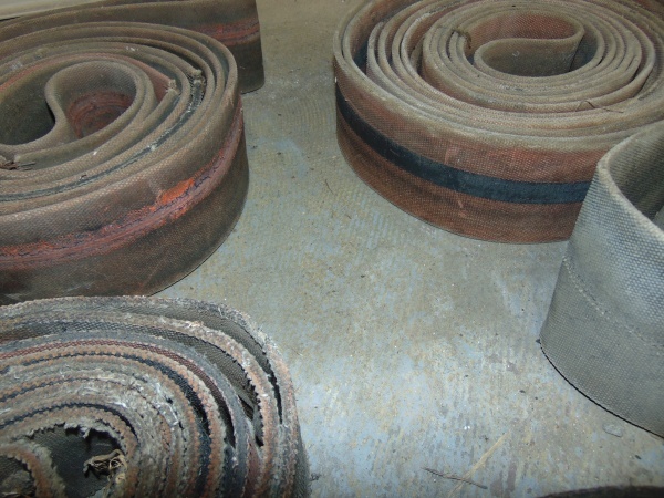 lot 35 image: (5) Vintage Tractor Belts
