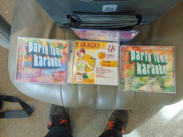 lot 155 image: Small Karaoke Machine With CDs