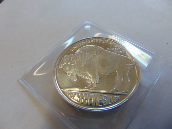 lot 180 image: Silver Dollar