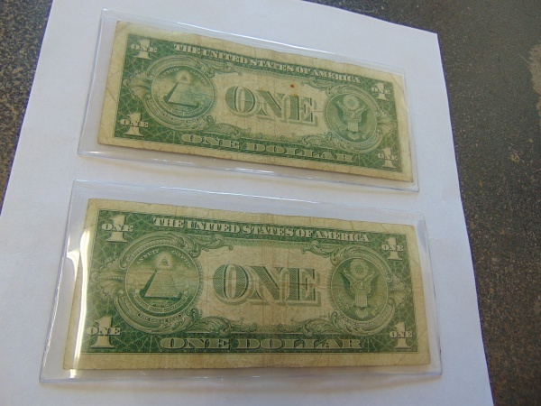 lot 182 image: (2) Silver Certificate Dollars