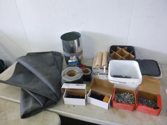 lot 184 image: Rubber Roofing Items.