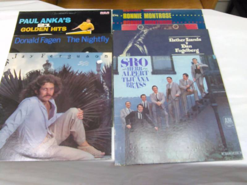 lot 60 image: Solo Albums (6) Paul Anka Golden Hits, Jay Ferguson  Thunder Island, Donald Fagen  The night Fly, Herb Albert  SRO, Dan Fogelberg  Netherland, Ronnie Mantrose  Open Fire