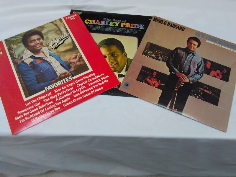 lot 69 image: Charlie Pride (2)  Merle Haggard Charlie Pride  Charlie Favorites (double album) and Greatest Hits, Merle Haggard  Okie from Muskogee