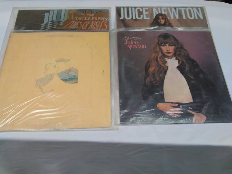 lot 77 image: Juice Newton (2) Self-titled, Quiet Lies  Joni Mitchell (2) Miles of Isles, Court and Spark