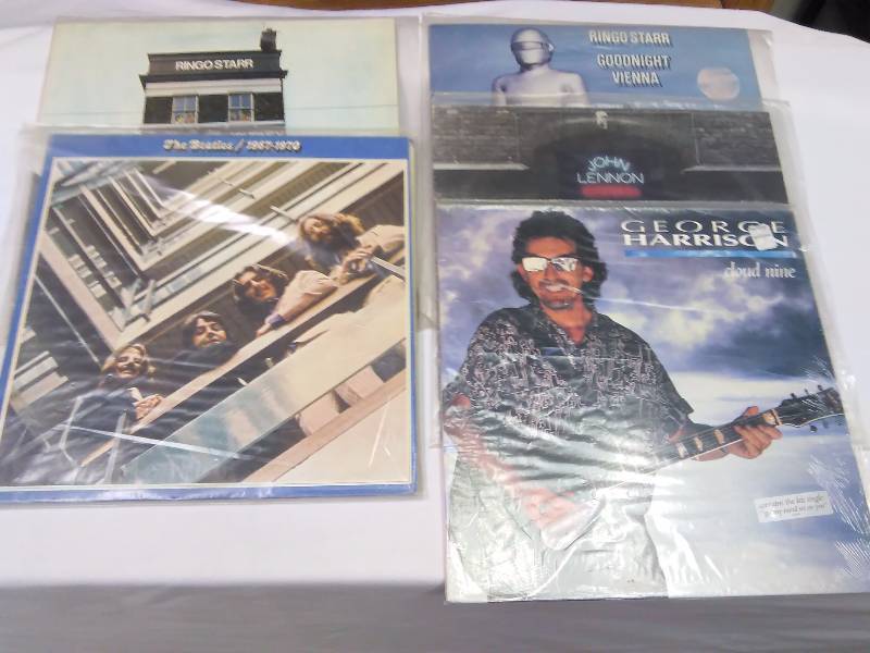 lot 134 image: Beatles (5) Beatles 1969-1970 The Blue Album, Ringo Star Good Night Vienna, Sentimental Journey, George Harrison Cloud Nine, John Lennon Rock N Roll