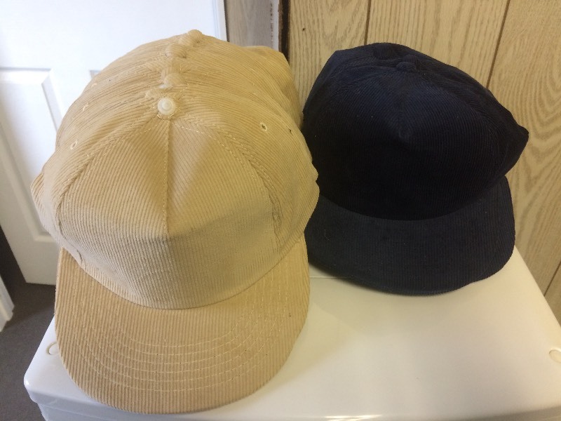 lot 27 image: BASEBALL STYLE HATS - TAN & NAVY BLUE