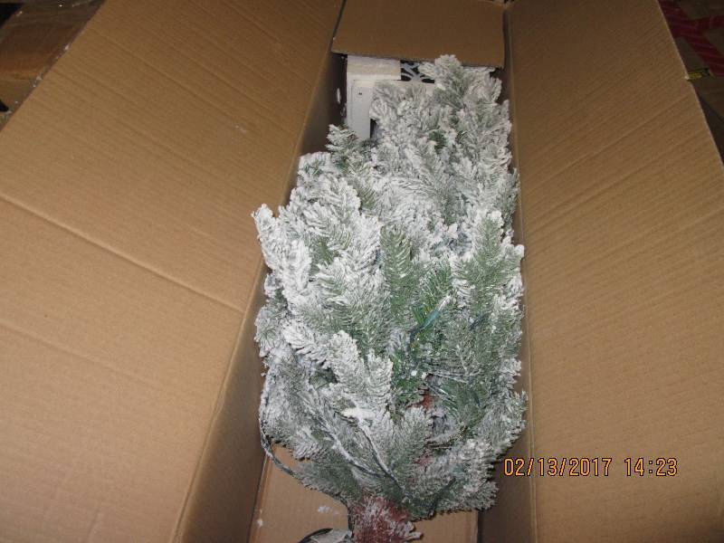 4 Ft  Pre-lit Flocked Tree with sta...