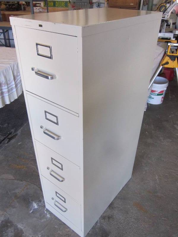 Two - 4 Drawer File Cabinets