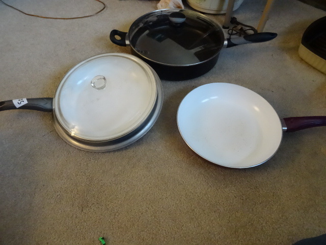 lot 50 image: 3 misc cooking pans. 2 with lids...