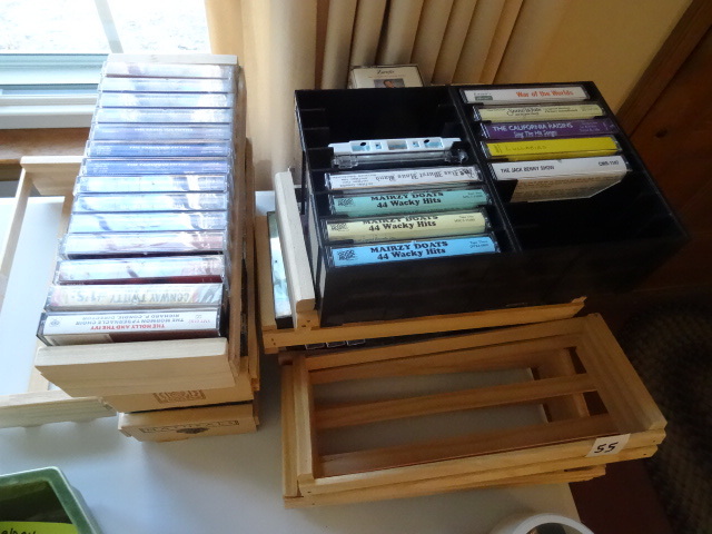 lot 55 image: Misc cassette tapes and racks. Capt...
